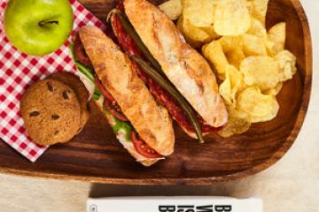 a box filled with different types of food on a table