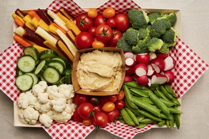 a box filled with different types of food on a table