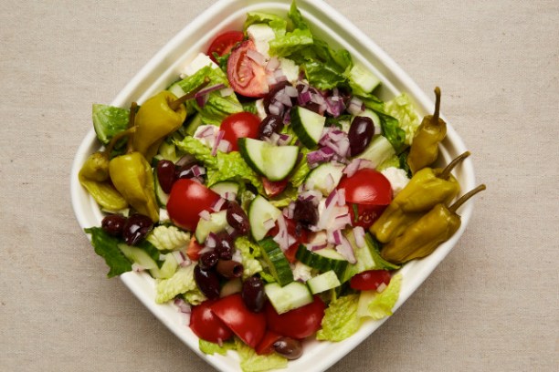 a bowl of fruit and vegetable salad