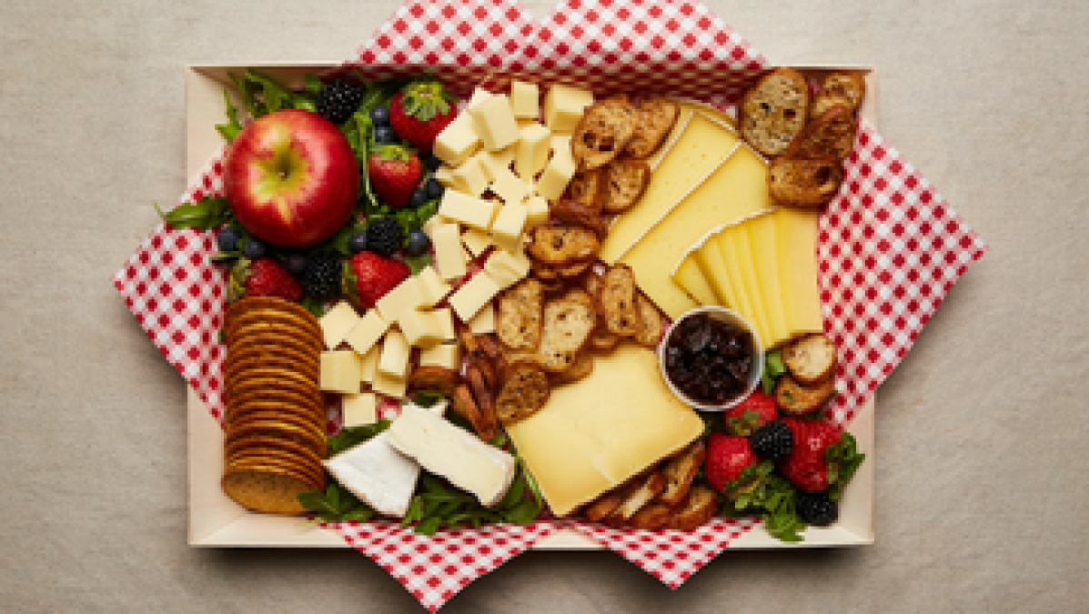 a box filled with different types of food on a table