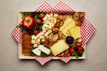 a box filled with different types of food on a table