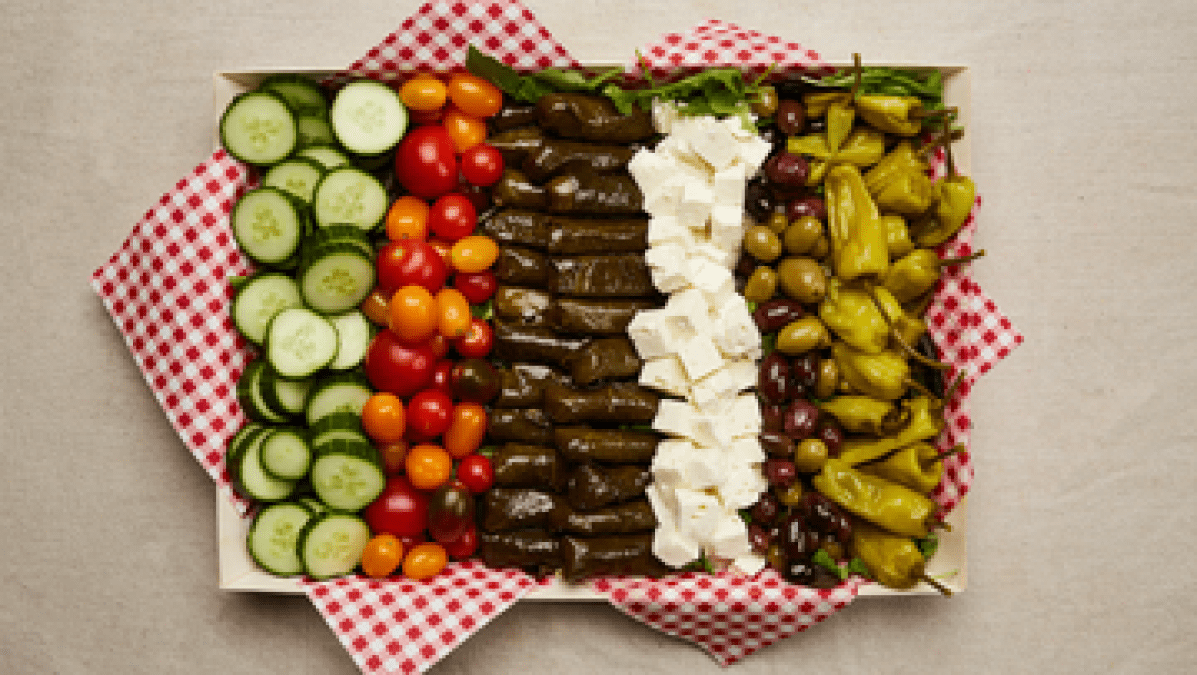 a cake with fruit on top of a table