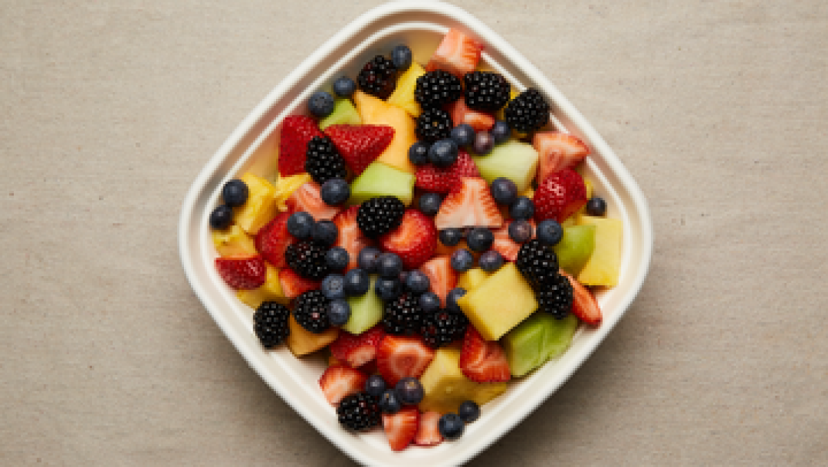a bowl of fruit on a plate