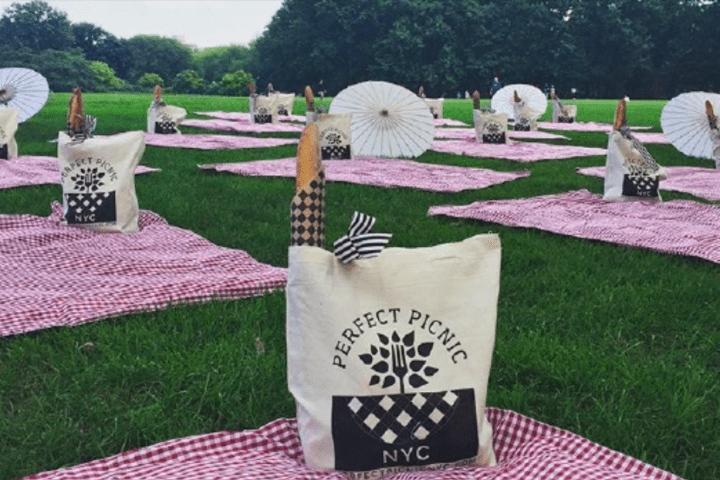 a couple of lawn chairs sitting on top of a picnic table